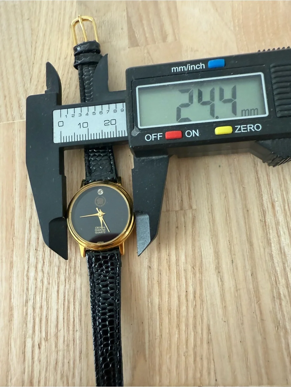 Reliance by croton diamond ladies black and gold tone watch NEW BATTERY